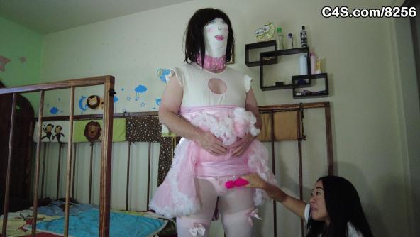 Turned into a pink diapered doll by dollmaker Diaperperv